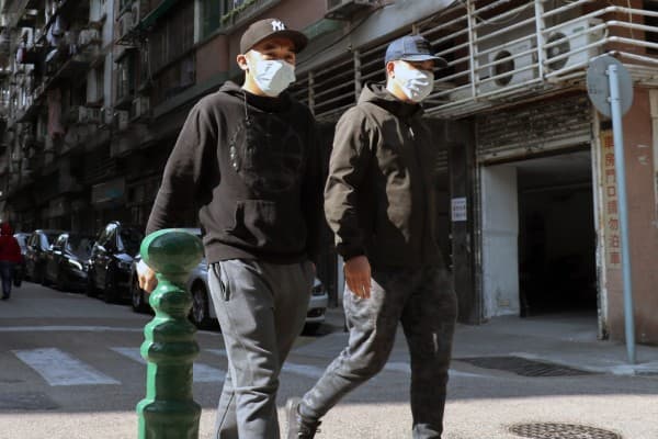 How will 2021 unfold? Two Hong Kong medical experts weigh in