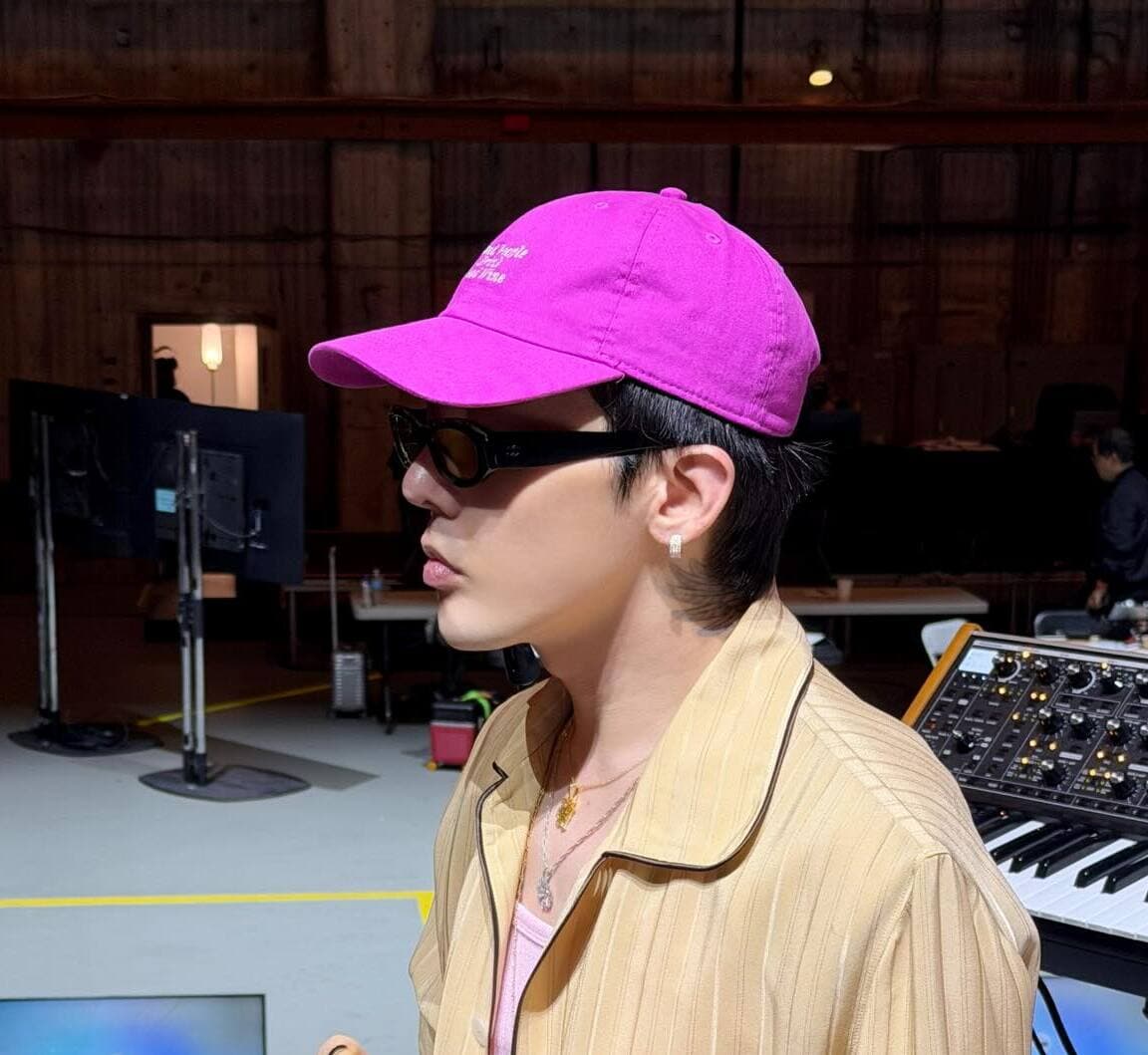 G-Dragon proves caps are the ultimate style hack